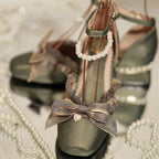 Inspired by the opulence of 19th-century Victorian soirées and the delicate artistry of heirloom jewelry, these shoes embody timeless romance. Each detail—from the lustrous pearls to the intricate lace ribbons—evokes a narrative of elegance and grace, designed for those who believe fashion is a preserved art form