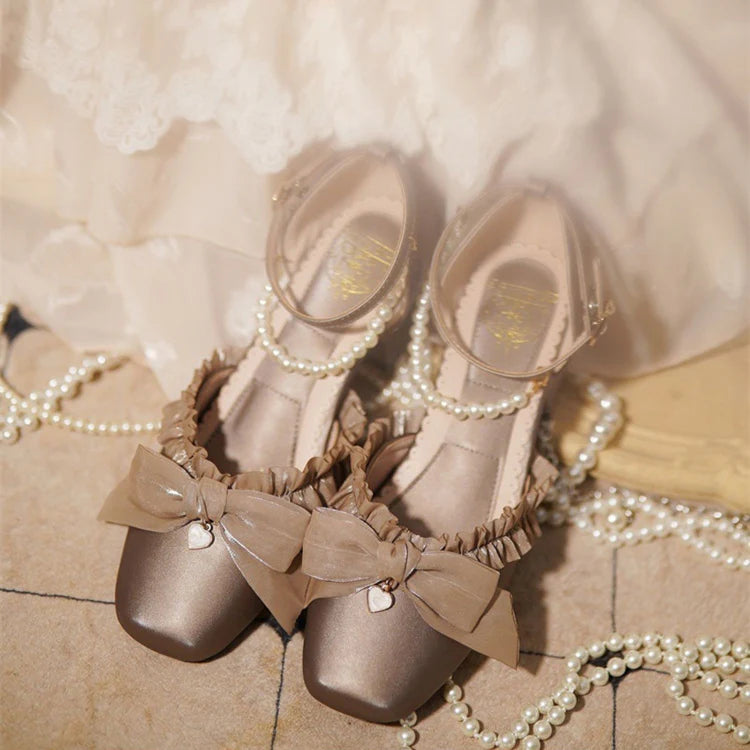 Inspired by the opulence of 19th-century Victorian soirées and the delicate artistry of heirloom jewelry, these shoes embody timeless romance. Each detail—from the lustrous pearls to the intricate lace ribbons—evokes a narrative of elegance and grace, designed for those who believe fashion is a preserved art form