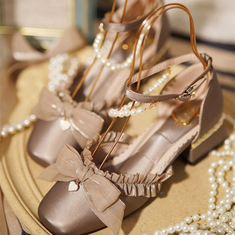 Inspired by the opulence of 19th-century Victorian soirées and the delicate artistry of heirloom jewelry, these shoes embody timeless romance. Each detail—from the lustrous pearls to the intricate lace ribbons—evokes a narrative of elegance and grace, designed for those who believe fashion is a preserved art form