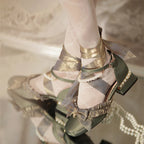 Inspired by the opulence of 19th-century Victorian soirées and the delicate artistry of heirloom jewelry, these shoes embody timeless romance. Each detail—from the lustrous pearls to the intricate lace ribbons—evokes a narrative of elegance and grace, designed for those who believe fashion is a preserved art form