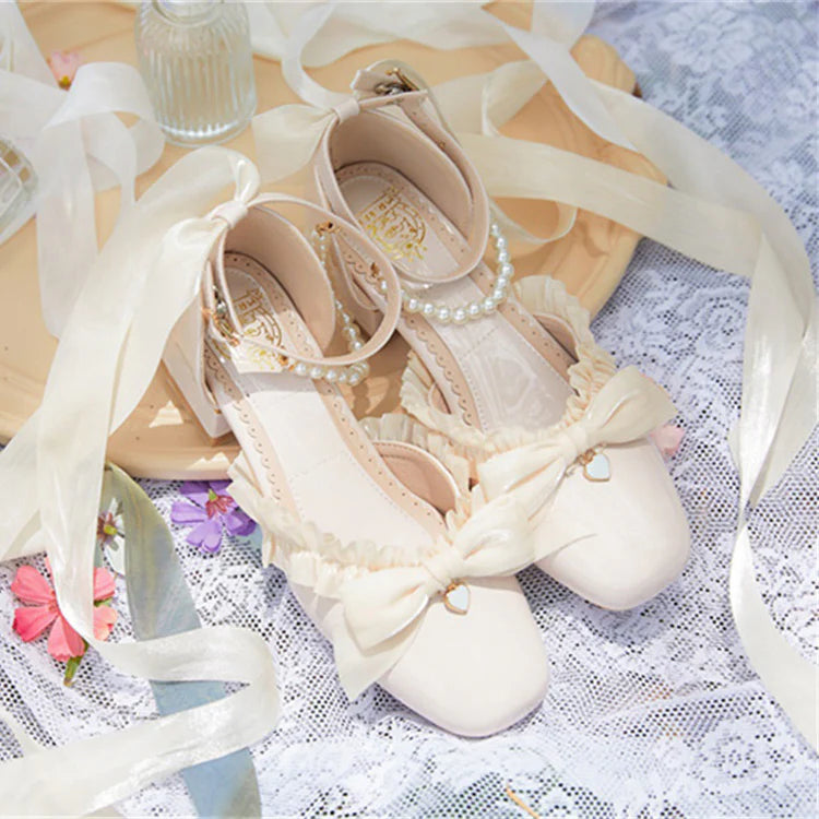 Inspired by the opulence of 19th-century Victorian soirées and the delicate artistry of heirloom jewelry, these shoes embody timeless romance. Each detail—from the lustrous pearls to the intricate lace ribbons—evokes a narrative of elegance and grace, designed for those who believe fashion is a preserved art form