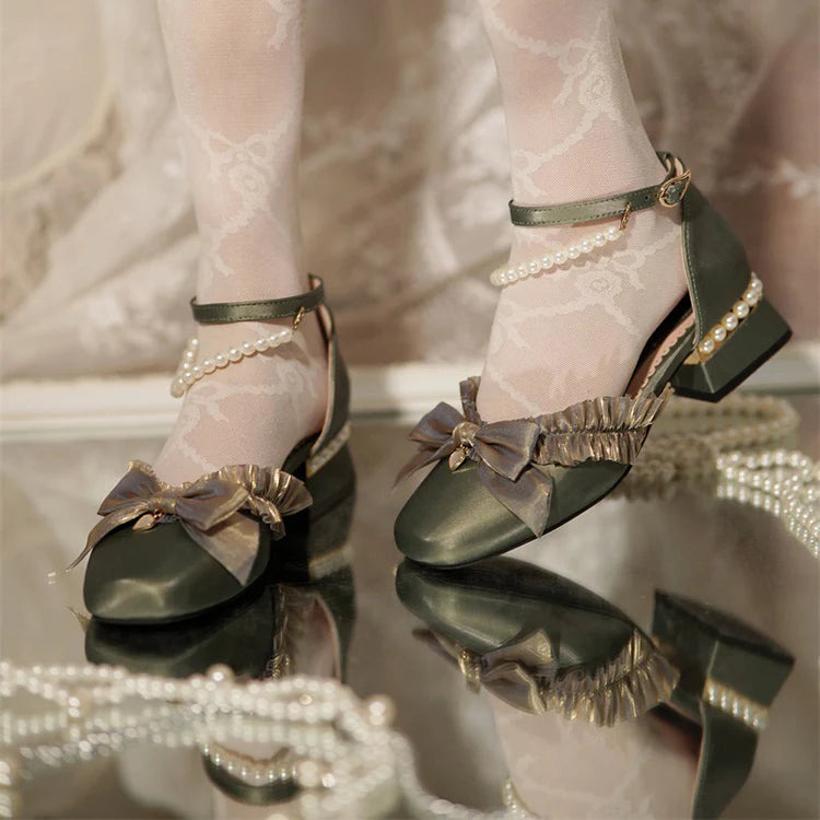 Inspired by the opulence of 19th-century Victorian soirées and the delicate artistry of heirloom jewelry, these shoes embody timeless romance. Each detail—from the lustrous pearls to the intricate lace ribbons—evokes a narrative of elegance and grace, designed for those who believe fashion is a preserved art form