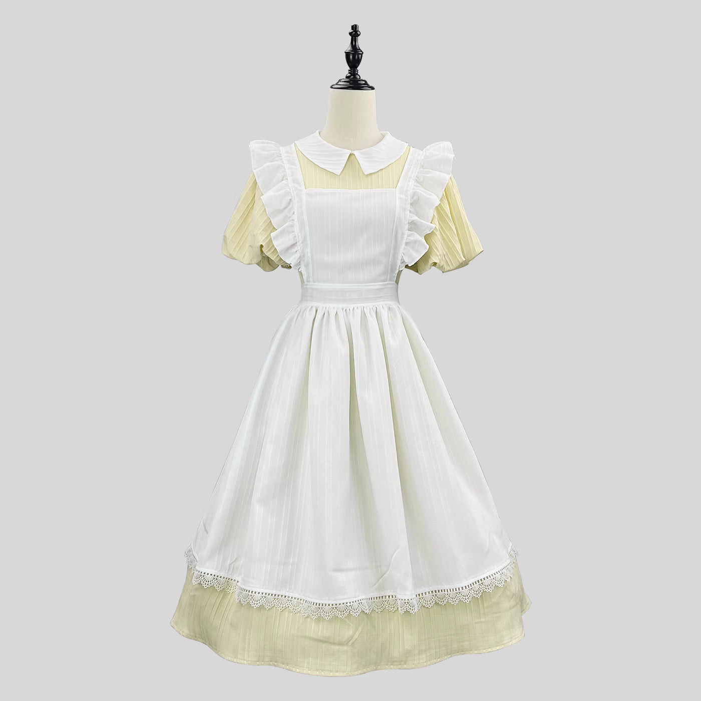 Inspired by classic French maid uniforms, this original Lolita dress combines soft powder blue and yellow hues with delicate lace trims. The modest long sleeves and high-neck design maintain elegance, while the detachable apron allows versatile styling. Crafted from breathable cotton blend, it balances nostalgic charm with modern comfort, perfect for both special occasions and refined daily wear.