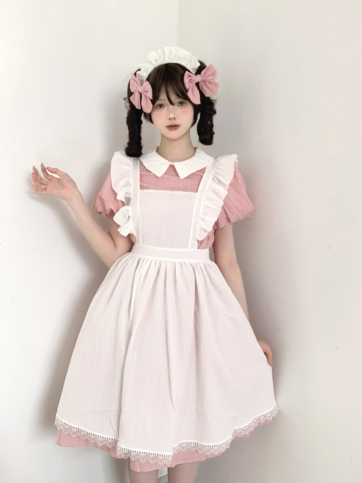 Inspired by classic French maid uniforms, this original Lolita dress combines soft powder blue and yellow hues with delicate lace trims. The modest long sleeves and high-neck design maintain elegance, while the detachable apron allows versatile styling. Crafted from breathable cotton blend, it balances nostalgic charm with modern comfort, perfect for both special occasions and refined daily wear.
