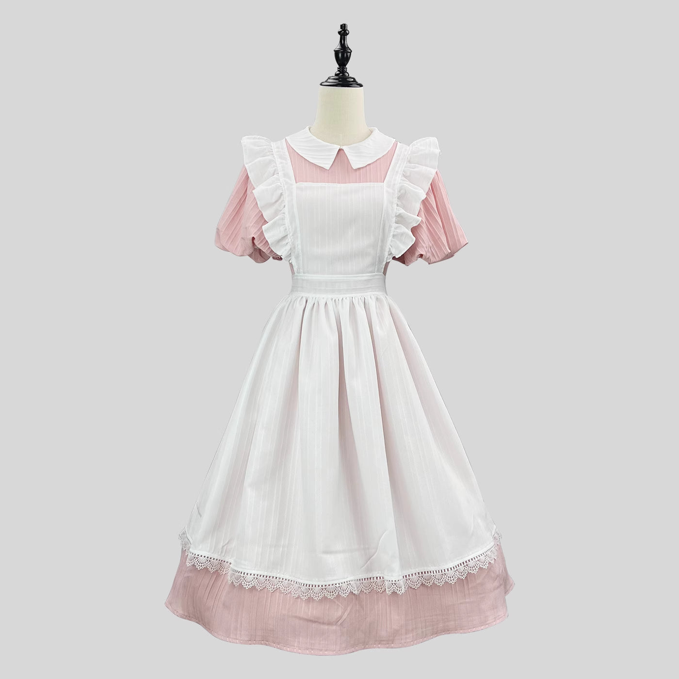 Inspired by classic French maid uniforms, this original Lolita dress combines soft powder blue and yellow hues with delicate lace trims. The modest long sleeves and high-neck design maintain elegance, while the detachable apron allows versatile styling. Crafted from breathable cotton blend, it balances nostalgic charm with modern comfort, perfect for both special occasions and refined daily wear.