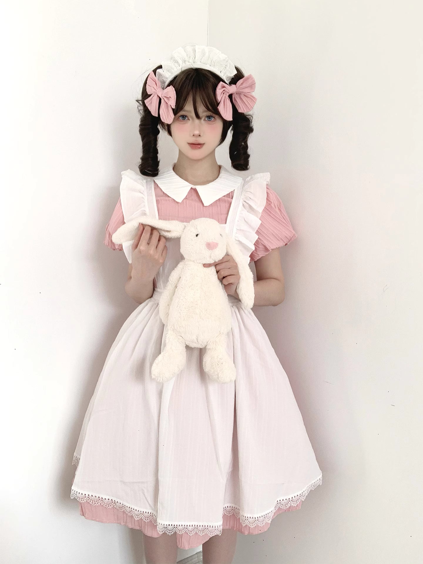 Inspired by classic French maid uniforms, this original Lolita dress combines soft powder blue and yellow hues with delicate lace trims. The modest long sleeves and high-neck design maintain elegance, while the detachable apron allows versatile styling. Crafted from breathable cotton blend, it balances nostalgic charm with modern comfort, perfect for both special occasions and refined daily wear.