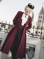This Gothic-inspired ensemble reimagines the Dracula legend with a dark romantic aesthetic. The deep crimson palette and intricate medieval tailoring—featuring ruffled shirts, structured coats, and tailored trousers—evoke aristocratic elegance. Luxurious velvets and detailed metallic accents capture a haunting yet refined atmosphere, blending historical drama with Lolita fashion for a timelessly captivating&nbsp;statement.
