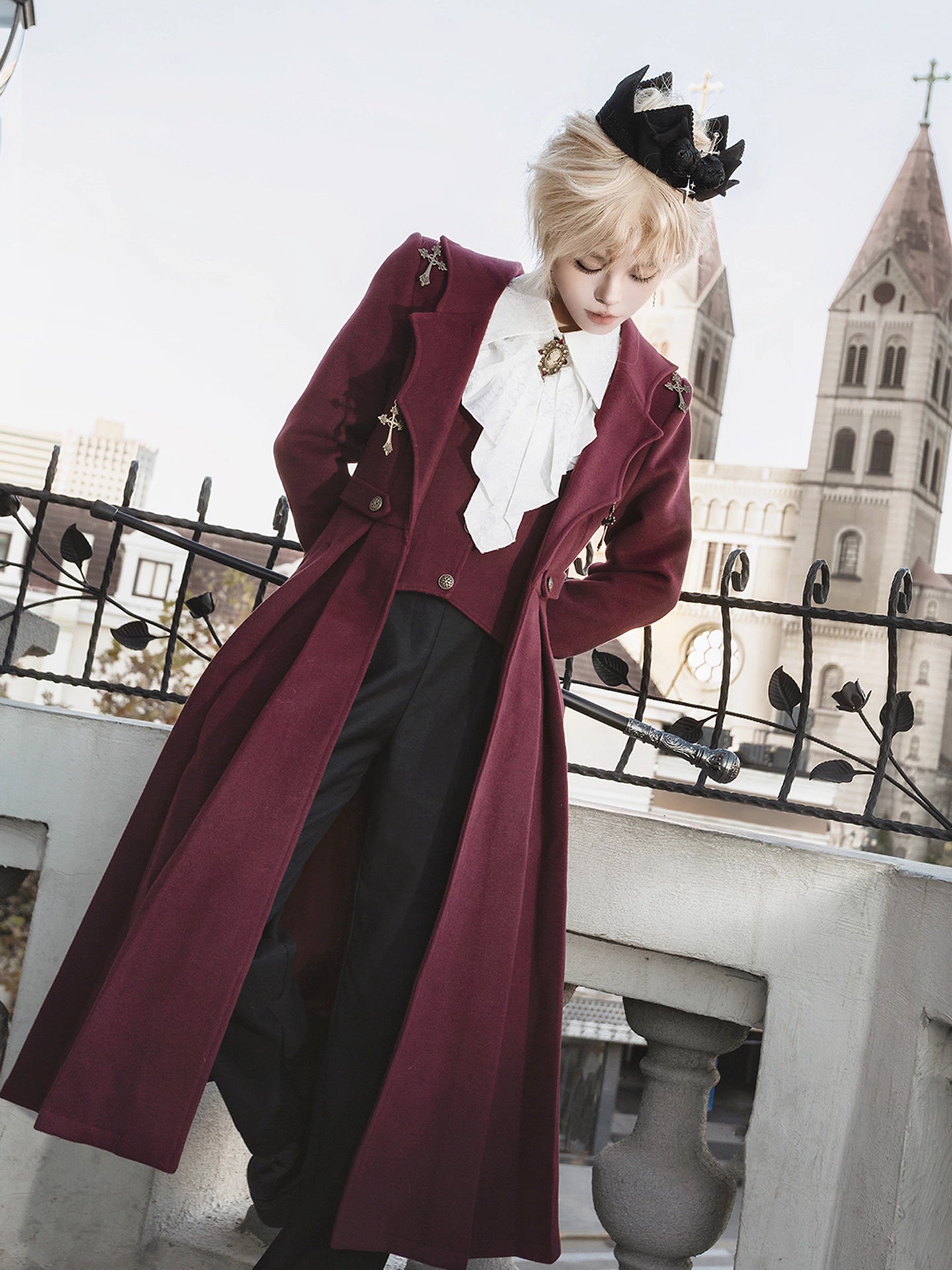 This Gothic-inspired ensemble reimagines the Dracula legend with a dark romantic aesthetic. The deep crimson palette and intricate medieval tailoring—featuring ruffled shirts, structured coats, and tailored trousers—evoke aristocratic elegance. Luxurious velvets and detailed metallic accents capture a haunting yet refined atmosphere, blending historical drama with Lolita fashion for a timelessly captivating&nbsp;statement.