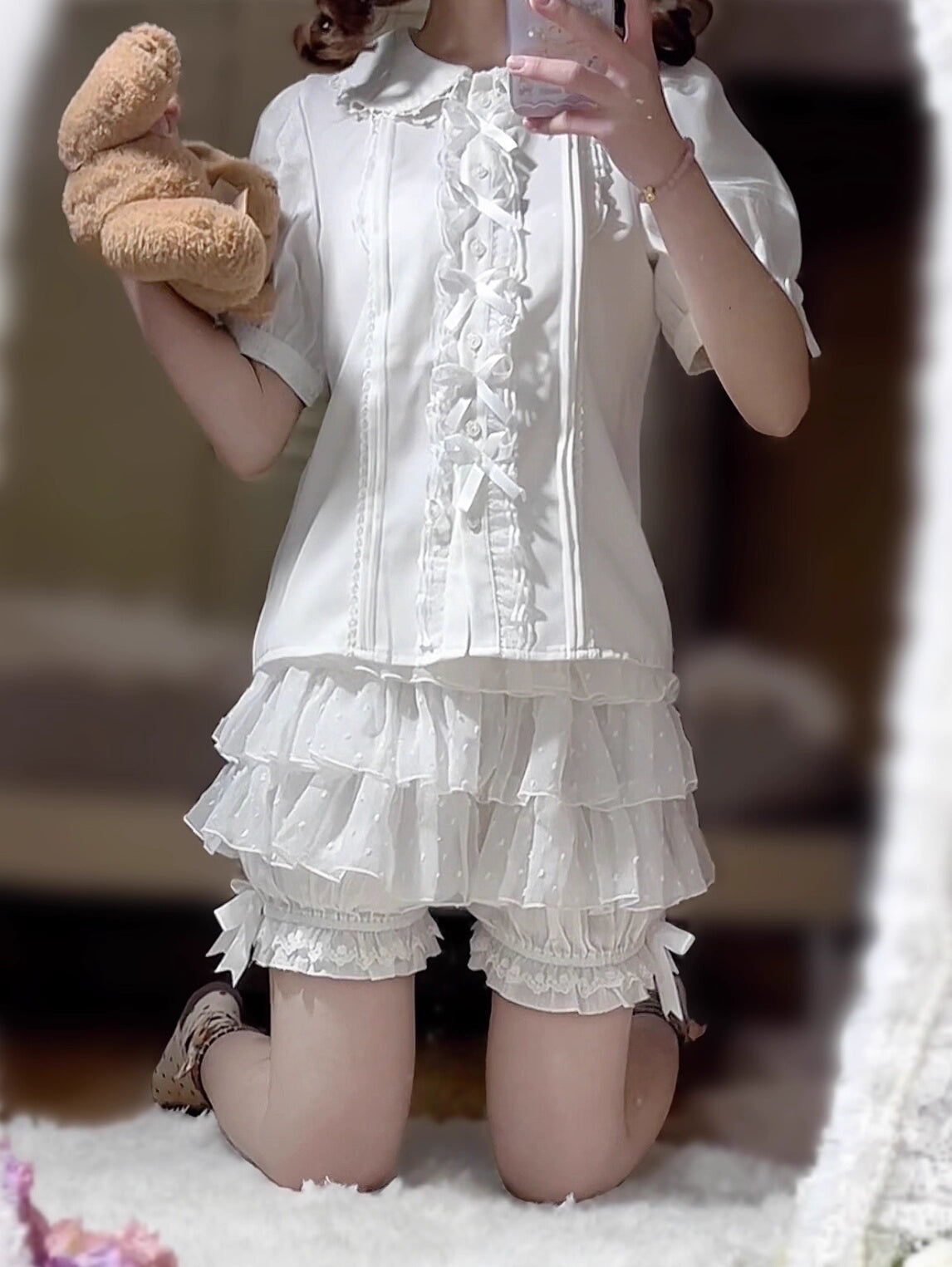 These delicate safety shorts combine functionality with Lolita aesthetics. Featuring lace-trimmed tiers and a bloomer-inspired design, they provide discreet coverage under skirts and dresses. Rendered in classic black and white, the lightweight fabric ensures comfort while adding a romantic touch to any coordination. Perfect for both sweet and Gothic styles, they offer practical elegance for dynamic wear.