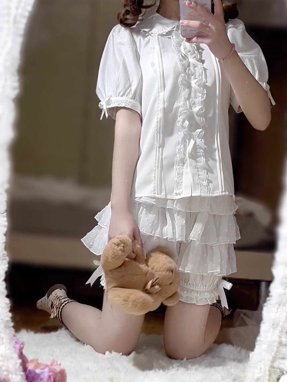 These delicate safety shorts combine functionality with Lolita aesthetics. Featuring lace-trimmed tiers and a bloomer-inspired design, they provide discreet coverage under skirts and dresses. Rendered in classic black and white, the lightweight fabric ensures comfort while adding a romantic touch to any coordination. Perfect for both sweet and Gothic styles, they offer practical elegance for dynamic wear.