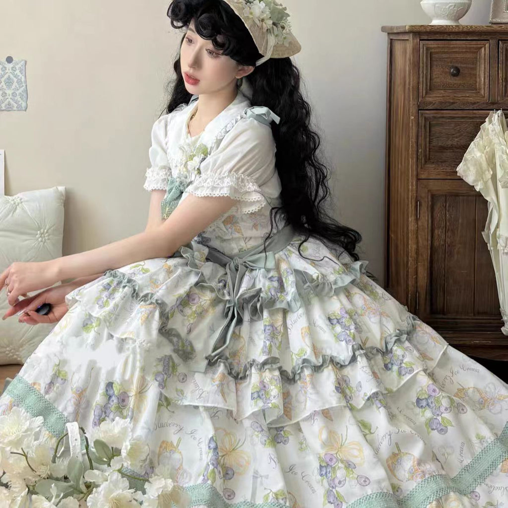 This Purple Green Classic Sweet Lolita JSK Dress is crafted to blend elegance with playful charm. The sleeveless design highlights the triple-layered ruffles and soft lace details, creating a light yet voluminous silhouette. Bowknot accents add a touch of sweetness, while the purple and green color combination offers a refreshing and unique vintage feel. Perfect for tea parties, daily outings, or themed events, this dress reflects timeless Lolita grace with a colorful twist.