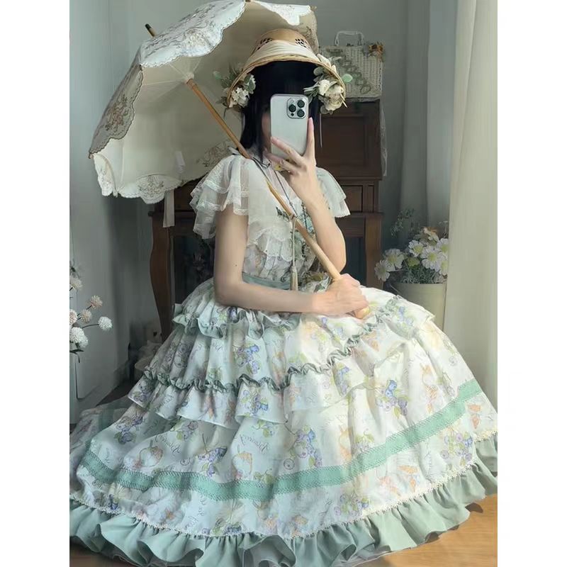 This Purple Green Classic Sweet Lolita JSK Dress is crafted to blend elegance with playful charm. The sleeveless design highlights the triple-layered ruffles and soft lace details, creating a light yet voluminous silhouette. Bowknot accents add a touch of sweetness, while the purple and green color combination offers a refreshing and unique vintage feel. Perfect for tea parties, daily outings, or themed events, this dress reflects timeless Lolita grace with a colorful twist.