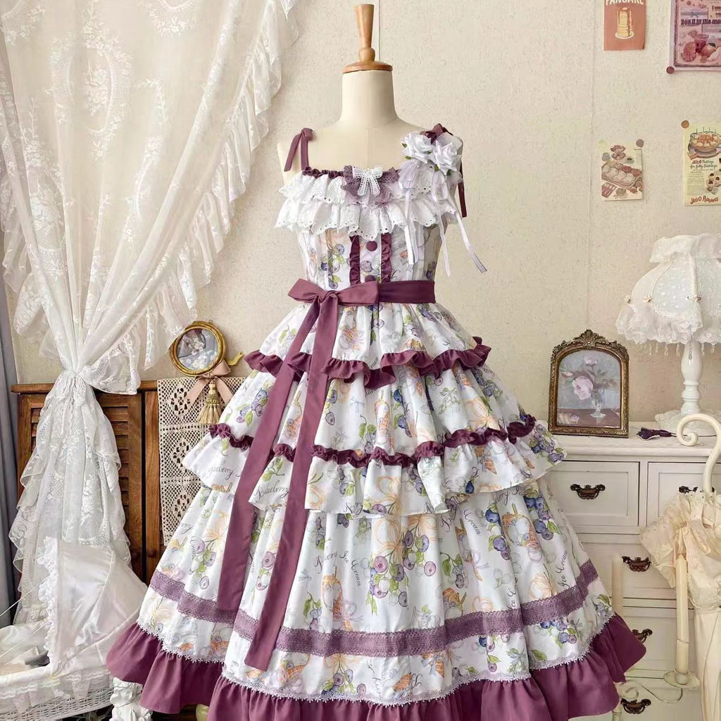 This Purple Green Classic Sweet Lolita JSK Dress is crafted to blend elegance with playful charm. The sleeveless design highlights the triple-layered ruffles and soft lace details, creating a light yet voluminous silhouette. Bowknot accents add a touch of sweetness, while the purple and green color combination offers a refreshing and unique vintage feel. Perfect for tea parties, daily outings, or themed events, this dress reflects timeless Lolita grace with a colorful twist.