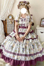 This Purple Green Classic Sweet Lolita JSK Dress is crafted to blend elegance with playful charm. The sleeveless design highlights the triple-layered ruffles and soft lace details, creating a light yet voluminous silhouette. Bowknot accents add a touch of sweetness, while the purple and green color combination offers a refreshing and unique vintage feel. Perfect for tea parties, daily outings, or themed events, this dress reflects timeless Lolita grace with a colorful twist.