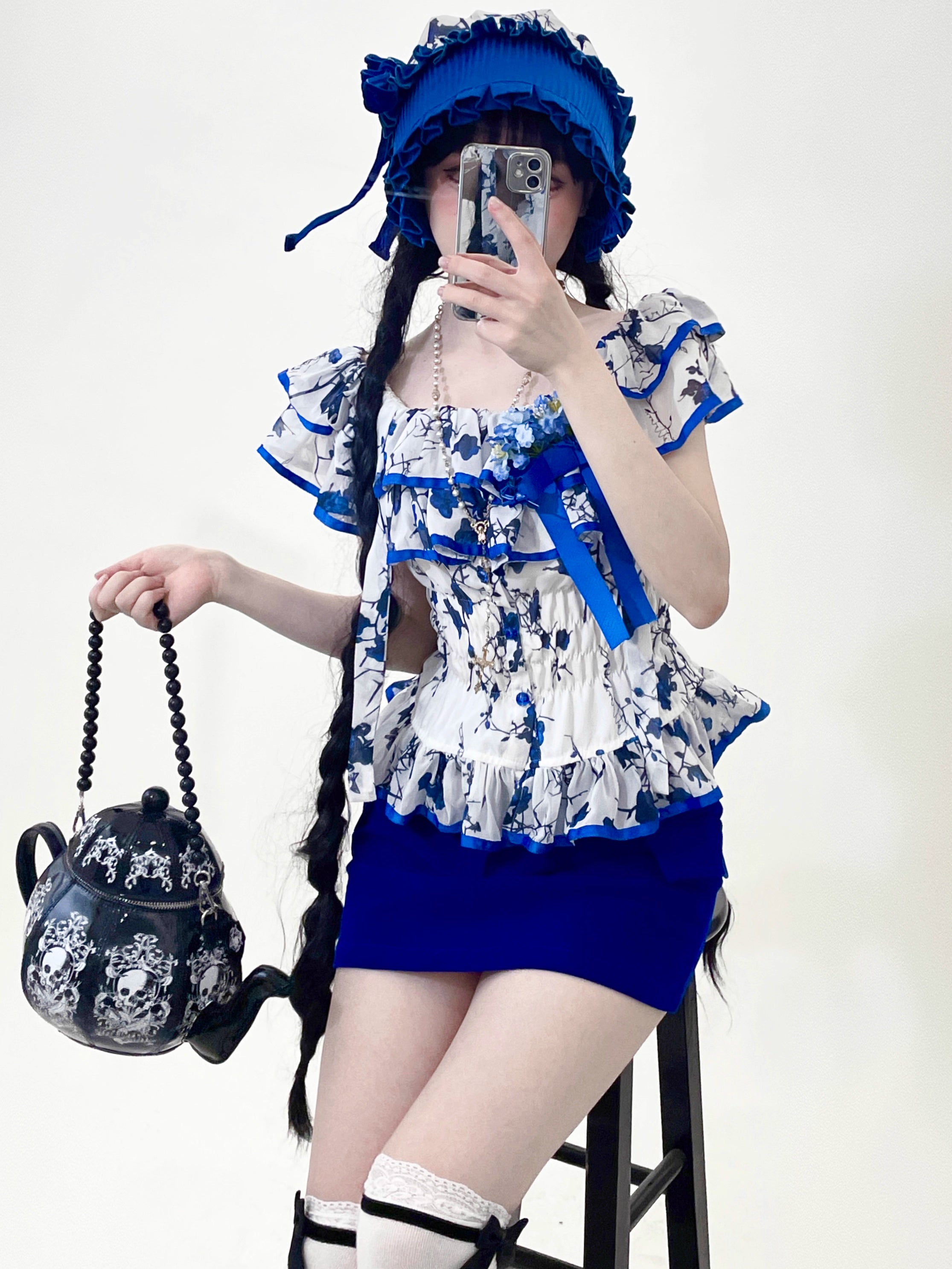 This Halloween Blue Gothic Lolita Set blends dark elegance with a playful festive twist. Featuring a classic shirt paired with a short skirt, the design highlights Gothic-inspired details while keeping a youthful Lolita silhouette. The deep blue tone adds mystery and charm, making it a unique choice for Halloween parties, cosplay, or themed gatherings. Stylish yet versatile, this set perfectly captures the balance of Gothic drama and Lolita sweetness.