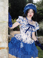 This Halloween Blue Gothic Lolita Set blends dark elegance with a playful festive twist. Featuring a classic shirt paired with a short skirt, the design highlights Gothic-inspired details while keeping a youthful Lolita silhouette. The deep blue tone adds mystery and charm, making it a unique choice for Halloween parties, cosplay, or themed gatherings. Stylish yet versatile, this set perfectly captures the balance of Gothic drama and Lolita sweetness.