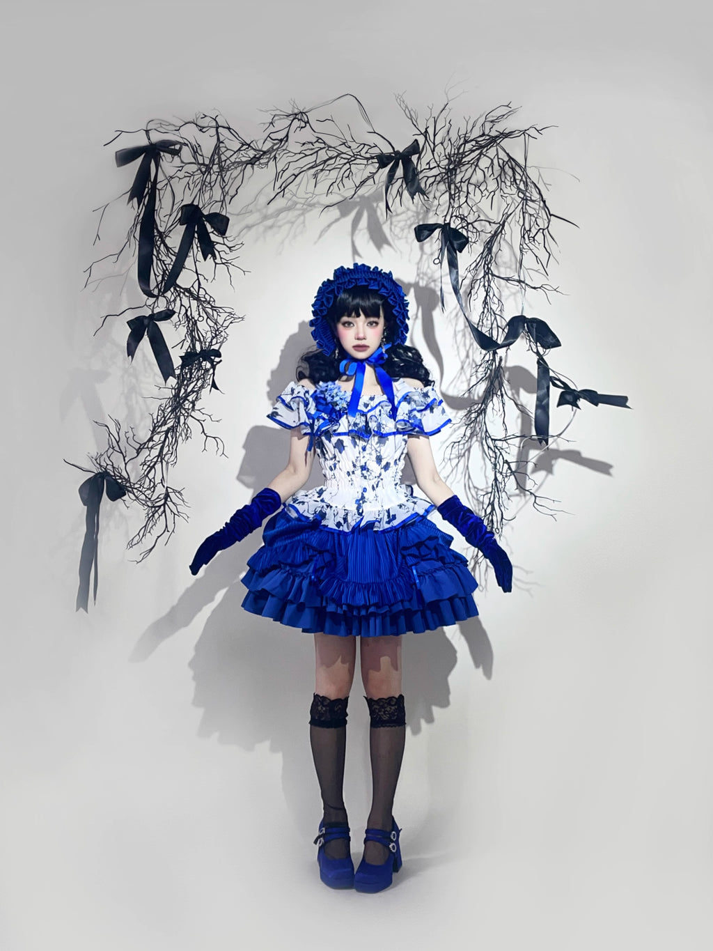 This Halloween Blue Gothic Lolita Set blends dark elegance with a playful festive twist. Featuring a classic shirt paired with a short skirt, the design highlights Gothic-inspired details while keeping a youthful Lolita silhouette. The deep blue tone adds mystery and charm, making it a unique choice for Halloween parties, cosplay, or themed gatherings. Stylish yet versatile, this set perfectly captures the balance of Gothic drama and Lolita sweetness.