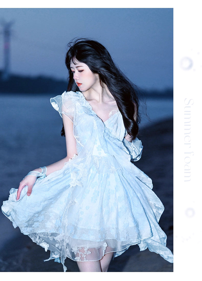 This Blue Sweet Lolita JSK Dress blends playful elegance with delicate craftsmanship. The sleeveless design highlights the airy ruffles and fine embroidery, while lace details add a touch of romance. Its irregular short hemline creates a lively and modern silhouette, perfect for expressing youthful charm. With a refreshing blue tone, this dress is ideal for tea parties, casual gatherings, or themed events, embodying both the sweetness and sophistication of Lolita fashion.