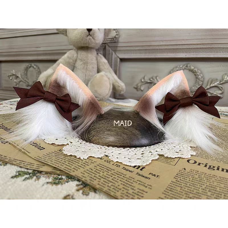 This Lolita Handmade Cat Ear Headband is designed to add a playful and charming touch to Lolita styling. Featuring soft tabby and calico patterns, the realistic animal ear design brings a cute, whimsical feel while maintaining elegance. Lightweight and comfortable, it pairs perfectly with sweet or cosplay-inspired Lolita looks. Ideal for tea parties, themed events, or photoshoots, this headband offers a unique blend of fun, craftsmanship, and Lolita charm.