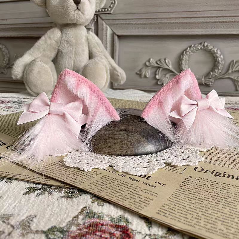 This Lolita Handmade Cat Ear Headband is designed to add a playful and charming touch to Lolita styling. Featuring soft tabby and calico patterns, the realistic animal ear design brings a cute, whimsical feel while maintaining elegance. Lightweight and comfortable, it pairs perfectly with sweet or cosplay-inspired Lolita looks. Ideal for tea parties, themed events, or photoshoots, this headband offers a unique blend of fun, craftsmanship, and Lolita charm.