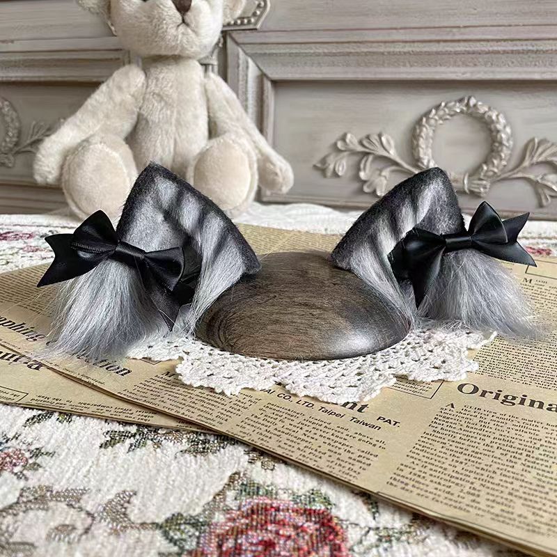 This Lolita Handmade Cat Ear Headband is designed to add a playful and charming touch to Lolita styling. Featuring soft tabby and calico patterns, the realistic animal ear design brings a cute, whimsical feel while maintaining elegance. Lightweight and comfortable, it pairs perfectly with sweet or cosplay-inspired Lolita looks. Ideal for tea parties, themed events, or photoshoots, this headband offers a unique blend of fun, craftsmanship, and Lolita charm.