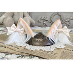 This Lolita Handmade Cat Ear Headband is designed to add a playful and charming touch to Lolita styling. Featuring soft tabby and calico patterns, the realistic animal ear design brings a cute, whimsical feel while maintaining elegance. Lightweight and comfortable, it pairs perfectly with sweet or cosplay-inspired Lolita looks. Ideal for tea parties, themed events, or photoshoots, this headband offers a unique blend of fun, craftsmanship, and Lolita charm.