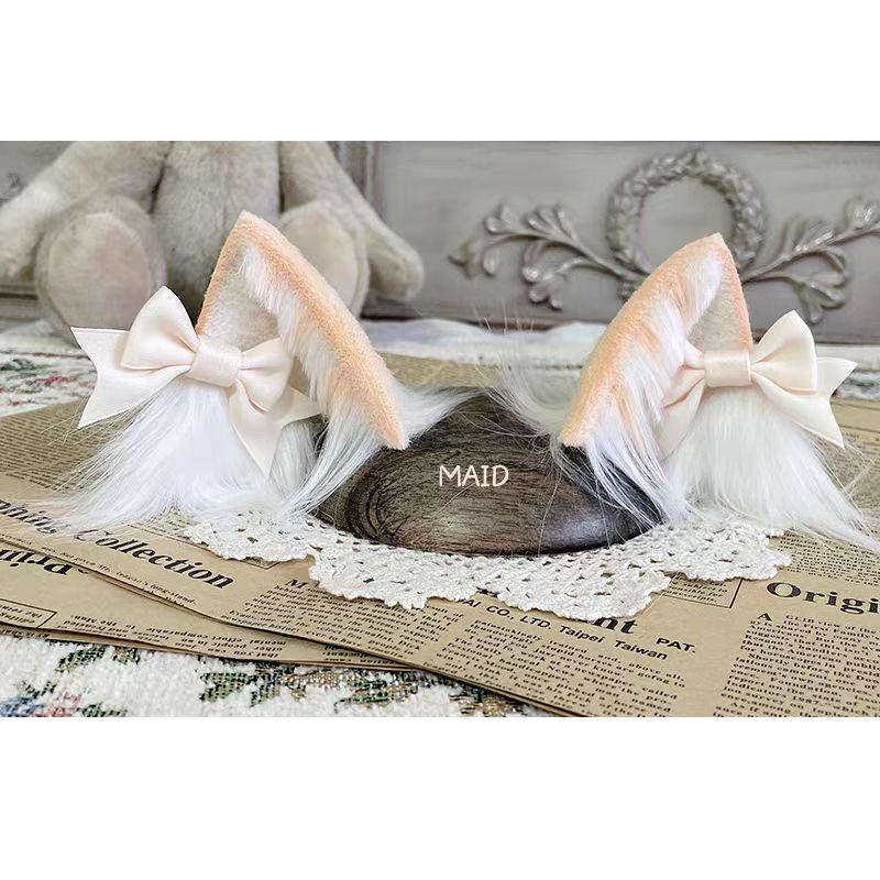 This Lolita Handmade Cat Ear Headband is designed to add a playful and charming touch to Lolita styling. Featuring soft tabby and calico patterns, the realistic animal ear design brings a cute, whimsical feel while maintaining elegance. Lightweight and comfortable, it pairs perfectly with sweet or cosplay-inspired Lolita looks. Ideal for tea parties, themed events, or photoshoots, this headband offers a unique blend of fun, craftsmanship, and Lolita charm.