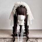 This Lolita Handmade Cake Hat Headband is crafted with a whimsical dessert-inspired design that adds sweetness to any Lolita look. Styled in a soft cream beige tone, it resembles a delicate cake adorned with charming details for a playful yet elegant touch. The handmade craftsmanship ensures uniqueness, while customizable color options allow for personal styling. Perfect for tea parties, themed events, or photoshoots, this accessory brings a fun and enchanting accent to Lolita fashion.