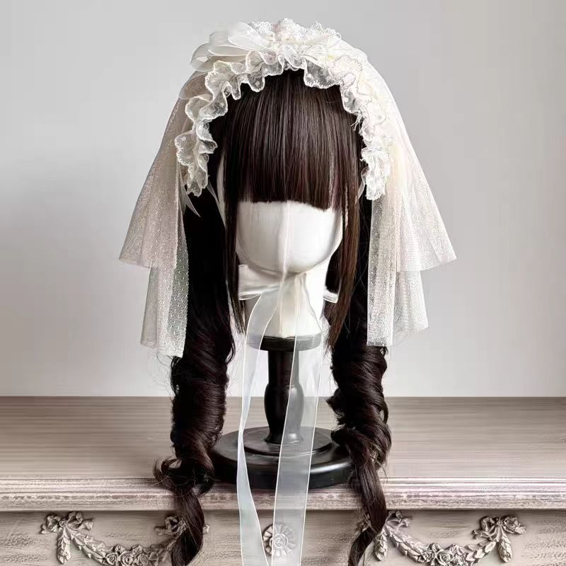 This Lolita Handmade Cake Hat Headband is crafted with a whimsical dessert-inspired design that adds sweetness to any Lolita look. Styled in a soft cream beige tone, it resembles a delicate cake adorned with charming details for a playful yet elegant touch. The handmade craftsmanship ensures uniqueness, while customizable color options allow for personal styling. Perfect for tea parties, themed events, or photoshoots, this accessory brings a fun and enchanting accent to Lolita fashion.