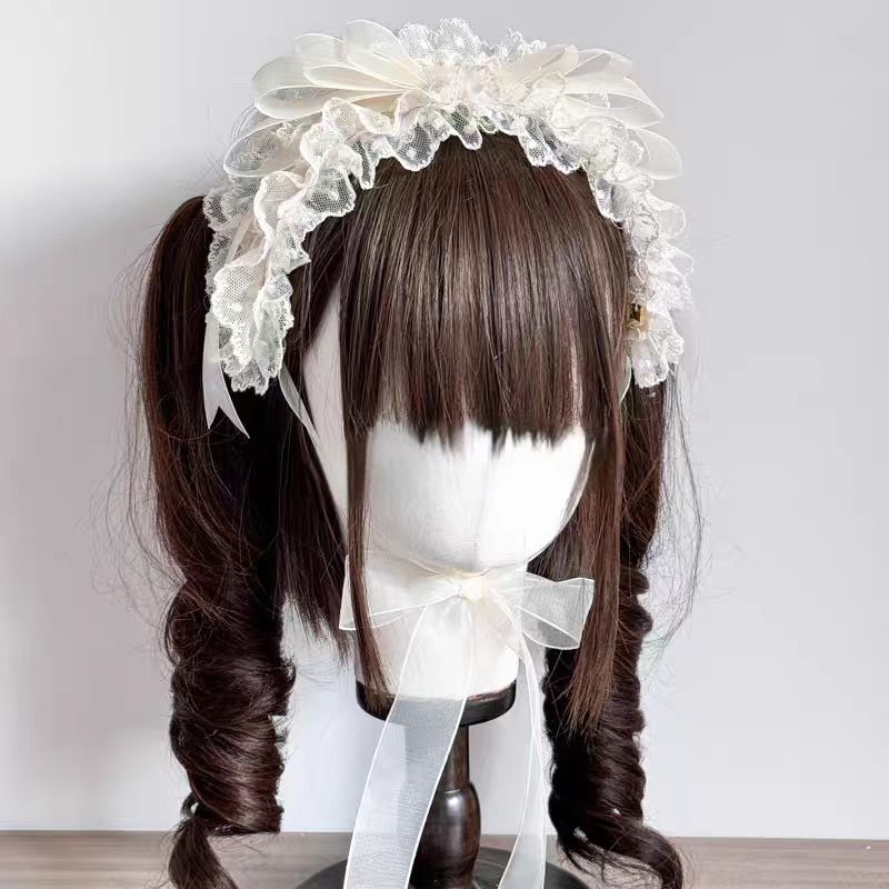 This Lolita Handmade Cake Hat Headband is crafted with a whimsical dessert-inspired design that adds sweetness to any Lolita look. Styled in a soft cream beige tone, it resembles a delicate cake adorned with charming details for a playful yet elegant touch. The handmade craftsmanship ensures uniqueness, while customizable color options allow for personal styling. Perfect for tea parties, themed events, or photoshoots, this accessory brings a fun and enchanting accent to Lolita fashion.