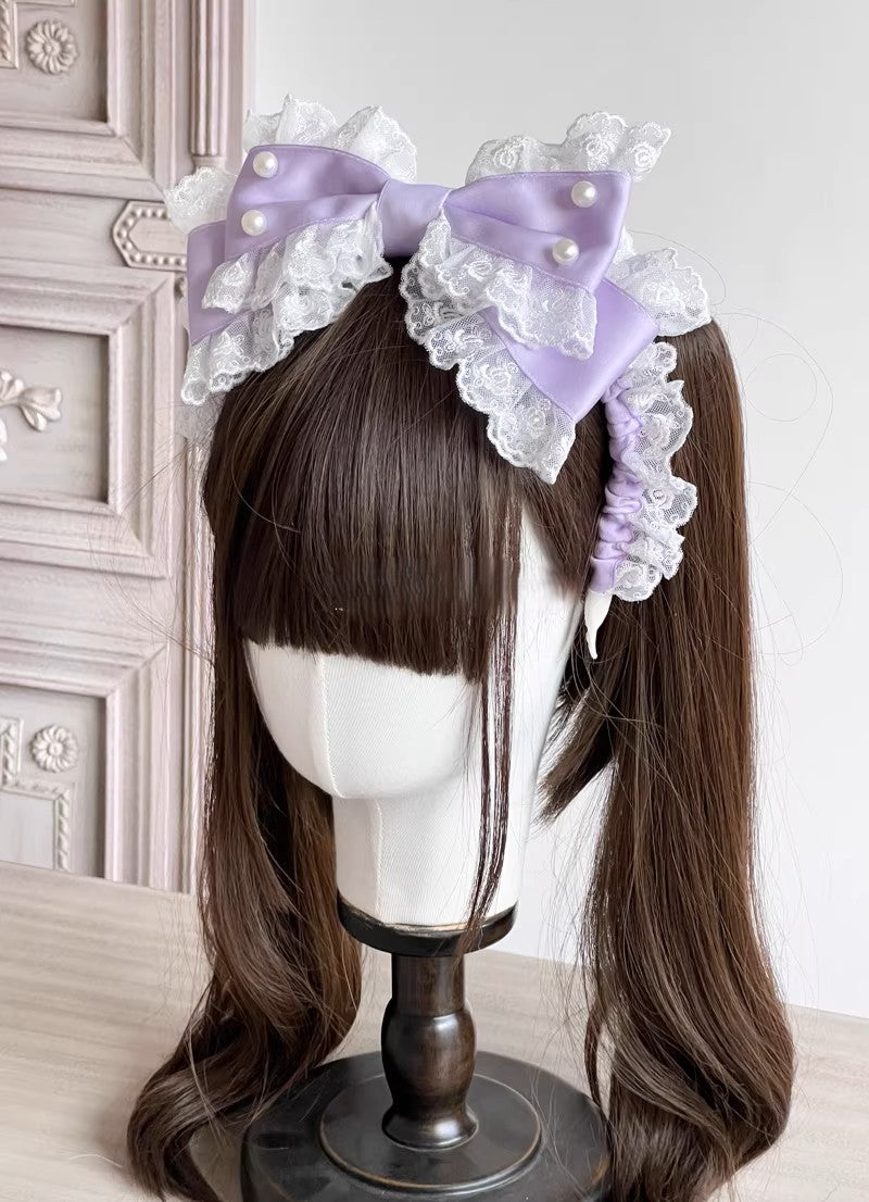 This Lolita KC Headband is a delicate handmade accessory designed to complete any Lolita outfit. Crafted with fine lace and adorned with charming bowknots, it offers a versatile and elegant touch. Available in multiple colors, it allows for easy coordination with sweet, classic, or gothic Lolita styles. Perfect for tea parties, daily wear, or themed gatherings, this KC headband adds a graceful finishing detail that enhances the overall Lolita aesthetic.