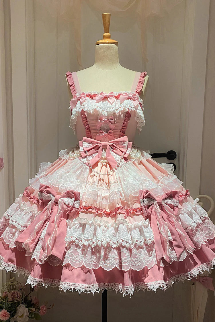 This Pink Sweet Gorgeous Lolita Doll JSK Dress is designed to capture a fairytale-like charm. Featuring a sleeveless cut with multi-layered ruffles, delicate lace, and playful bowknot accents, it creates a voluminous and dreamy silhouette. The soft pink tone enhances its doll-like sweetness, while the detailed craftsmanship adds elegance and grace. Perfect for tea parties, photoshoots, or special gatherings, this dress embodies the enchanting beauty of classic sweet Lolita fashion.