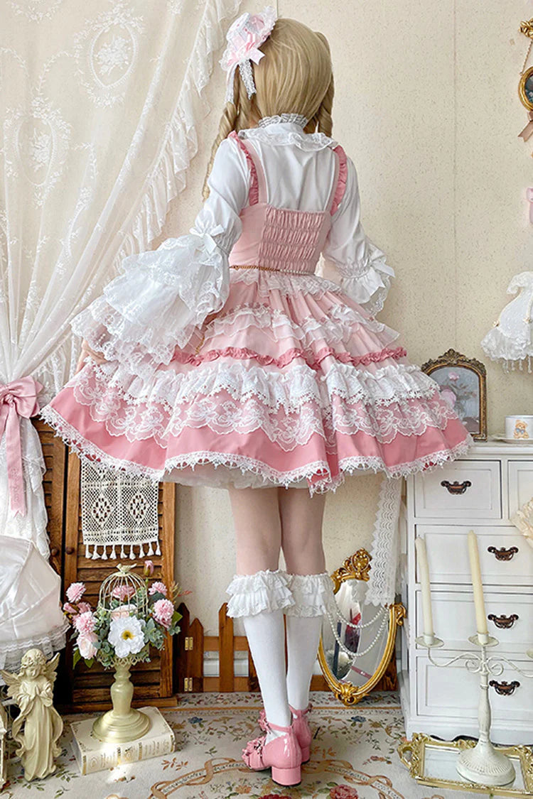 This Pink Sweet Gorgeous Lolita Doll JSK Dress is designed to capture a fairytale-like charm. Featuring a sleeveless cut with multi-layered ruffles, delicate lace, and playful bowknot accents, it creates a voluminous and dreamy silhouette. The soft pink tone enhances its doll-like sweetness, while the detailed craftsmanship adds elegance and grace. Perfect for tea parties, photoshoots, or special gatherings, this dress embodies the enchanting beauty of classic sweet Lolita fashion.