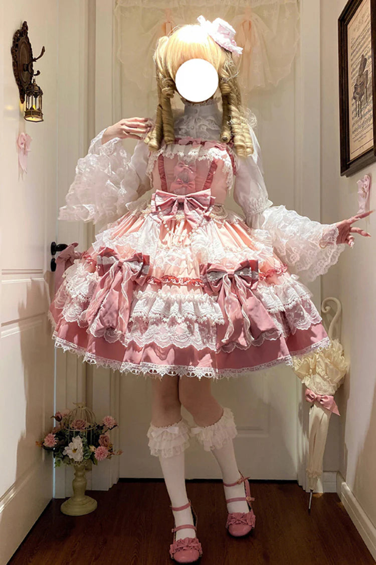 This Pink Sweet Gorgeous Lolita Doll JSK Dress is designed to capture a fairytale-like charm. Featuring a sleeveless cut with multi-layered ruffles, delicate lace, and playful bowknot accents, it creates a voluminous and dreamy silhouette. The soft pink tone enhances its doll-like sweetness, while the detailed craftsmanship adds elegance and grace. Perfect for tea parties, photoshoots, or special gatherings, this dress embodies the enchanting beauty of classic sweet Lolita fashion.