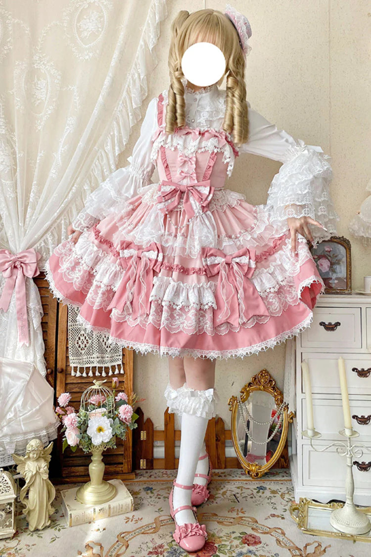 This Pink Sweet Gorgeous Lolita Doll JSK Dress is designed to capture a fairytale-like charm. Featuring a sleeveless cut with multi-layered ruffles, delicate lace, and playful bowknot accents, it creates a voluminous and dreamy silhouette. The soft pink tone enhances its doll-like sweetness, while the detailed craftsmanship adds elegance and grace. Perfect for tea parties, photoshoots, or special gatherings, this dress embodies the enchanting beauty of classic sweet Lolita fashion.