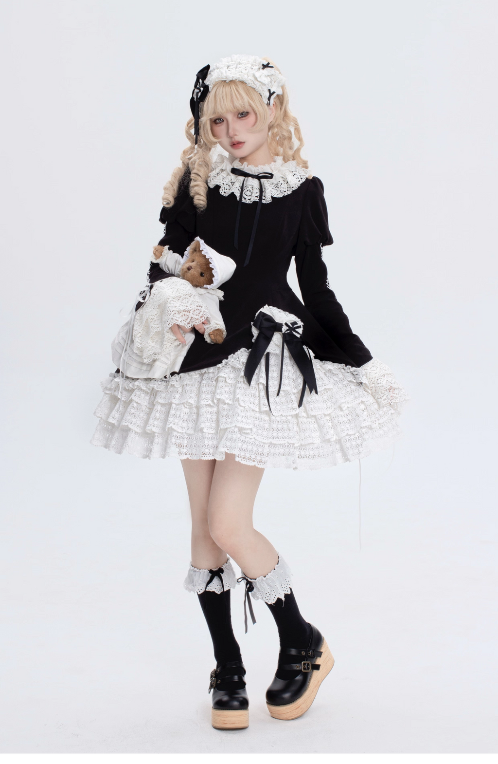 This Black White Doll Style Lolita Dress embodies a balance of sweetness and elegance with its refined lace trim and doll-like silhouette. The black and white palette creates a timeless contrast, while delicate details highlight the classic Lolita charm. Designed with a cute yet graceful aesthetic, it is perfect for tea parties, daily outings, or themed gatherings. A versatile piece that captures both playful innocence and the sophistication of traditional Lolita fashion.