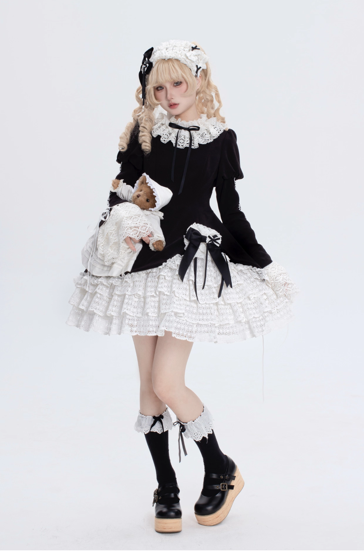 This Black White Doll Style Lolita Dress embodies a balance of sweetness and elegance with its refined lace trim and doll-like silhouette. The black and white palette creates a timeless contrast, while delicate details highlight the classic Lolita charm. Designed with a cute yet graceful aesthetic, it is perfect for tea parties, daily outings, or themed gatherings. A versatile piece that captures both playful innocence and the sophistication of traditional Lolita fashion.