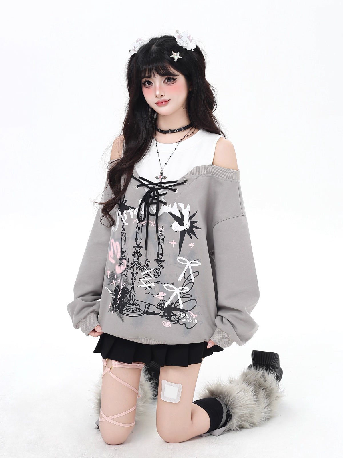 Design Concept:
This Lolita blouse features a playful two-layer design with a subtle off-shoulder cut, combining light gray and black for a chic, versatile look. Crafted for comfort and style, the blouse includes delicate bow tie details and a loose fit, perfect for autumn and winter casual wear. Ideal for daily Lolita outfits, tea parties, or streetwear styling, it adds a sweet yet slightly edgy touch to any ensemble.
