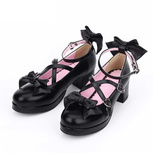 Inspired by the timeless elegance of ballet and the dramatic flair of Gothic romance, these shoes blend structured sophistication with whimsical charm. The cross-strap design echoes classical dance footwear, while the bold bow adds a touch of Lolita fantasy, creating a balance between strength and delicacy.
