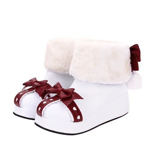 Inspired by the magic of snow-covered forests and the cozy charm of vintage winter illustrations, these boots blend practicality with fantasy. The plush lining and thick sole evoke warmth and comfort, while the oversized bow and round toe add a touch of childlike wonder, perfect for embracing the sweetness of the season.
