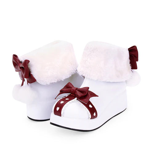 Inspired by the magic of snow-covered forests and the cozy charm of vintage winter illustrations, these boots blend practicality with fantasy. The plush lining and thick sole evoke warmth and comfort, while the oversized bow and round toe add a touch of childlike wonder, perfect for embracing the sweetness of the season.