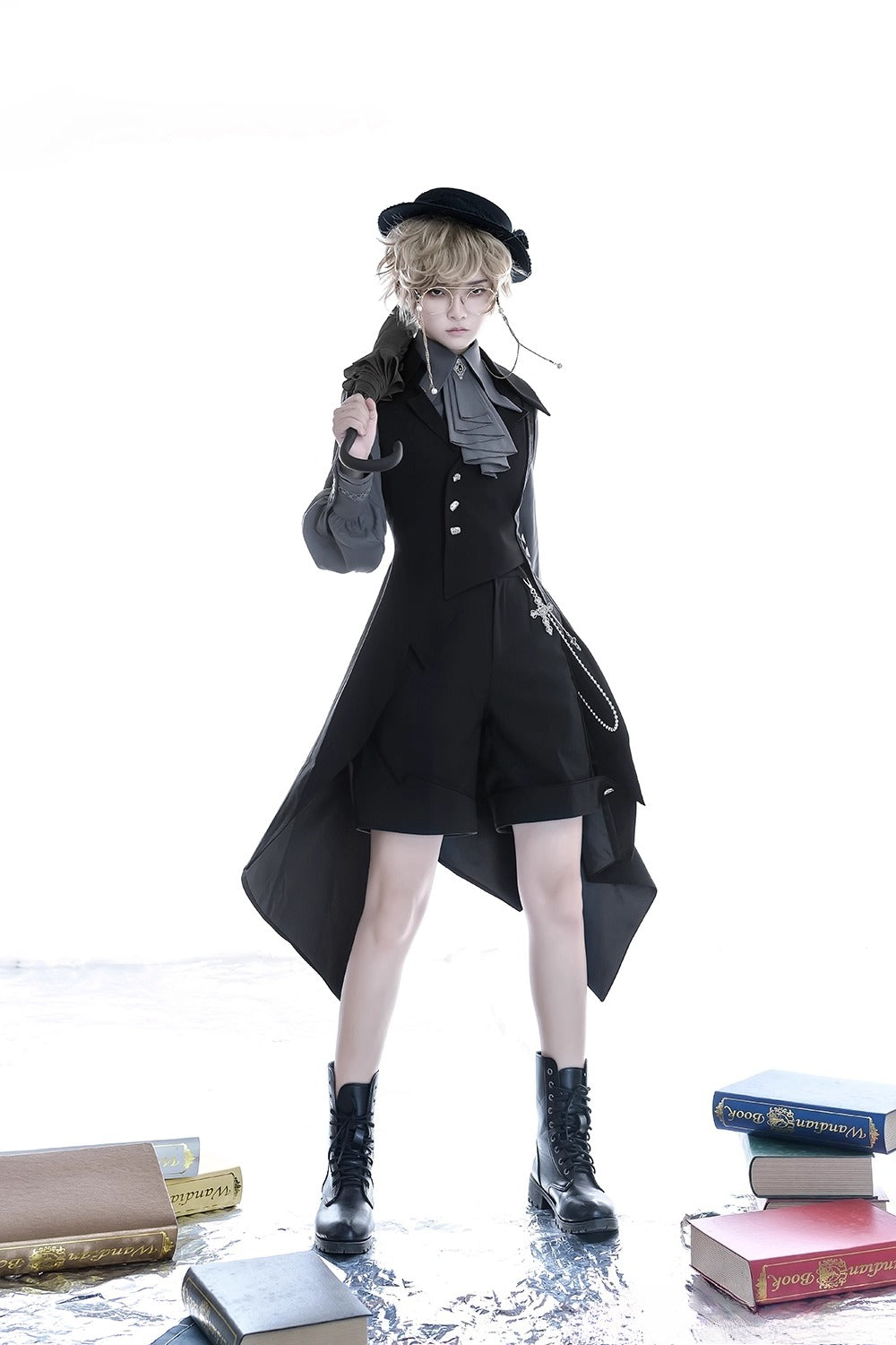 Design Concept:
This Ouji Fashion Lolita vest in classic black takes inspiration from medieval prince aesthetics with an asymmetrical long waistcoat design. Crafted with a refined silhouette, it blends vintage elegance with a bold modern edge. Available in both men’s and women’s versions, this versatile piece adds a statement layer to daily outfits, stage performances, or themed gatherings. Perfect for those who enjoy Ouji fashion’s balance of sophistication and individuality.