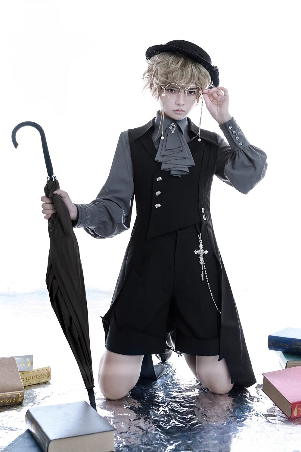 Design Concept:
This Ouji Fashion Lolita vest in classic black takes inspiration from medieval prince aesthetics with an asymmetrical long waistcoat design. Crafted with a refined silhouette, it blends vintage elegance with a bold modern edge. Available in both men’s and women’s versions, this versatile piece adds a statement layer to daily outfits, stage performances, or themed gatherings. Perfect for those who enjoy Ouji fashion’s balance of sophistication and individuality.