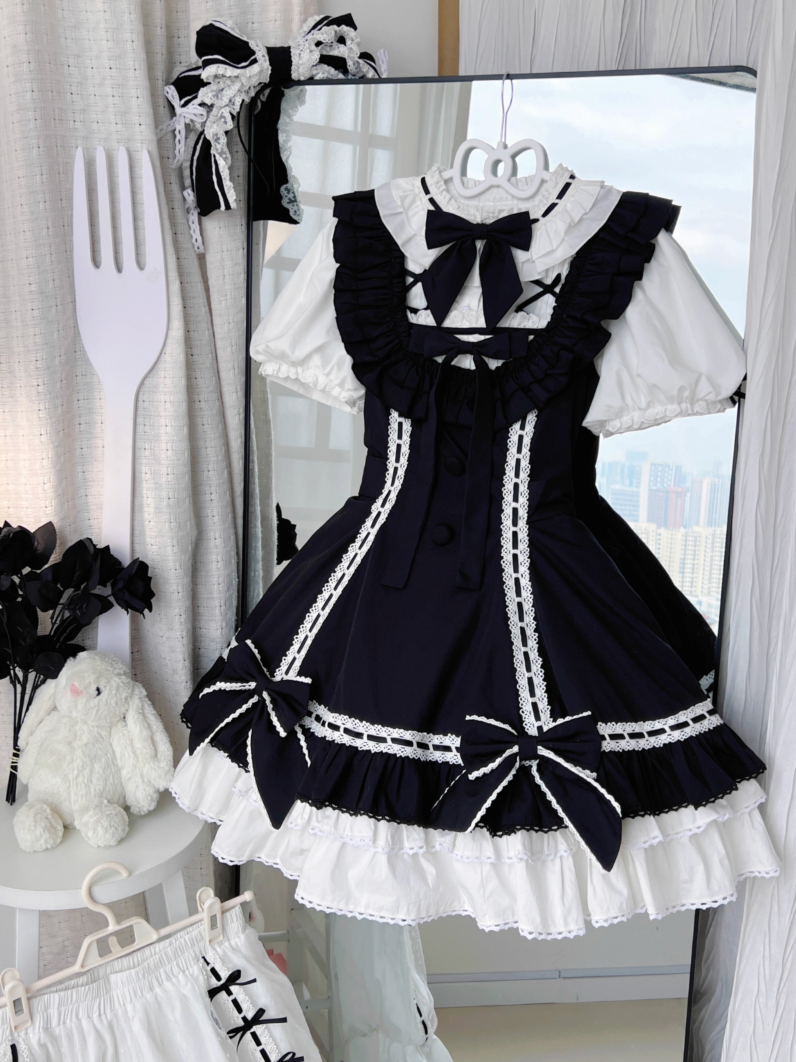 Design Concept:
This Sweet Lolita JSK features a playful doll-like silhouette, available in black, purple, and pink. Crafted for summer wear, the dress combines lightweight fabrics with delicate detailing to create a soft, elegant look. The high-quality stitching and charming design make it perfect for daily wear, casual outings, or tea parties, offering a sweet and youthful Lolita aesthetic.