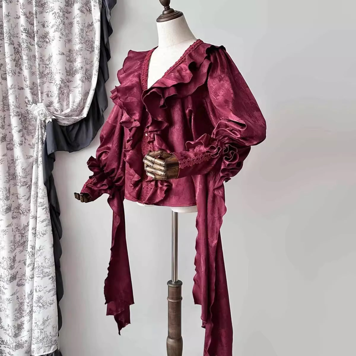Design Concept:

This Lolita Blouses pullover sweater combines playful charm with cozy comfort, crafted in black and wine red with delicate polka dot and star patterns. Featuring a classic round neck and a loose, relaxed fit, it offers an effortlessly sweet aesthetic perfect for autumn and winter casual wear. Each sweater comes with a matching scarf, adding an extra layer of warmth and style to complete your Lolita-inspired look. Ideal for daily outings, meetups, or tea parties, this sweater blends cute des
