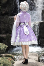 The Qi Lolita Blue Purple JSK Dress blends traditional Chinese charm with the sweetness of Lolita fashion. Featuring layered ruffles, delicate prints, and a harmonious mix of blue and purple hues, it creates a graceful, fairytale-like silhouette. The design draws inspiration from oriental elegance while embracing the playful spirit of Lolita. Perfect for tea parties, cultural events, or daily wear, it conveys both romantic beauty and unique cultural sophistication.