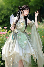 "Silk and Poetry"&nbsp;— This dress draws inspiration from the graceful fusion of 1930s Shanghai art deco elegance and the untamed beauty of Jiangnan landscapes. The halter neckline echoes the minimalist charm of vintage cheongsam, while asymmetrical ruffles emulate the organic flow of lotus leaves on water—blending structured tradition with whimsical movement.