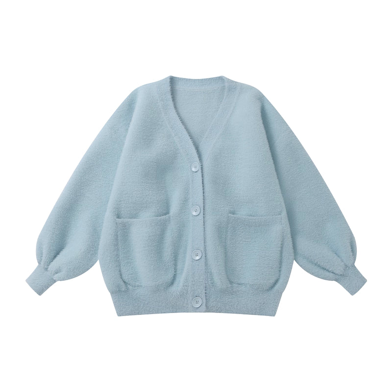 Designed for petite frames, this irresistibly plush cardigan wraps you in a cloud of softness with its fuzzy knit texture and playful pink hue. The cropped silhouette and cozy long sleeves balance warmth with effortless style, while the lightweight construction makes it a versatile layer for crisp days. A sweet yet practical piece that feels like a warm hug on chilly mornings.