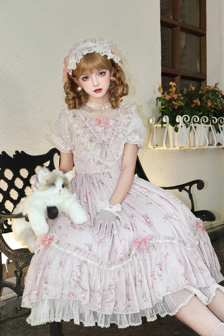 The Black Pink Floral Jacquard Lolita Dress is designed to balance elegance with sweetness. Featuring delicate floral jacquard fabric, soft ruffles, and refined embroidery, it exudes a sense of luxury and charm. The bowknot accents and short sleeves add a playful touch, while the contrasting black and pink tones highlight femininity. Perfect for tea parties, gatherings, or special occasions, this dress embodies the romantic essence of Sweet Lolita fashion.