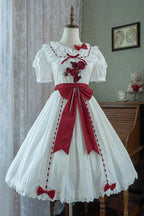This collection offers two timeless interpretations of Lolita elegance: the profound mystery of classic black and the pristine sweetness of pearl white. Both versions feature the same meticulous design—playful short sleeves, cascading ruffles, and satin bow accents—allowing wearers to choose a hue that reflects their unique style narrative. Whether embodying poetic darkness or luminous innocence, each dress celebrates the harmonious balance between tradition and fantasy.